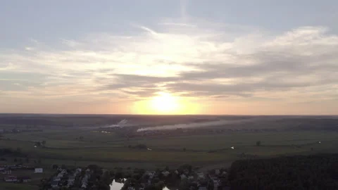 Burning grass in the field. the start of the fire. at sunset a field in smoke Stock-Footage 138362646