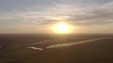 Burning grass in the field. the start of the fire. at sunset a field in smoke Stock-Footage 138366151
