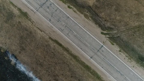 Burning Grass on the Side of the Road. Air View. Stock Footage 127801682