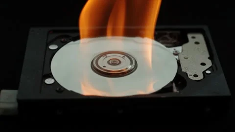 Burning hard disk drives on dark ground Stock Footage 93705583