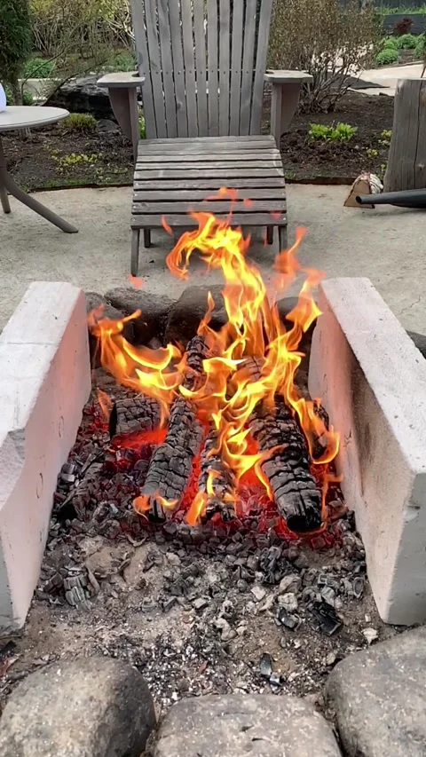 A burning hearth, preparing coals for the grill. Slow-motion shot. Stock Footage 341265394