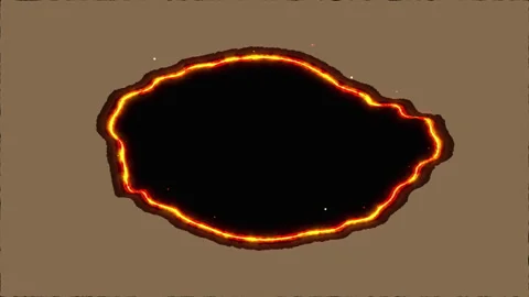 Burning hole effect with fire and glowing ember edge loop motion Stock Footage 347940937