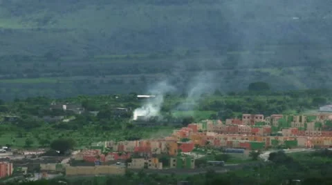 Burning home at distance Stock Footage 11340734