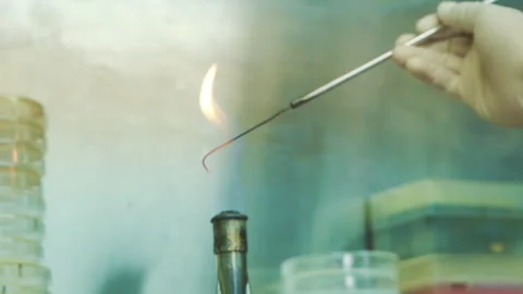 Burning Hook lab equipment close up slowmotion Stock Footage 246408689