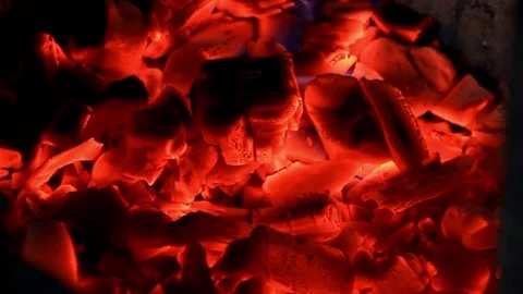 Burning hot coal in close up coals energy fossil 4k HD Vídeos de archivo 334651664