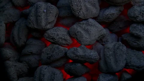 Burning hot coal in close up coals energy fossil 4k HD Stock-Footage 334654839
