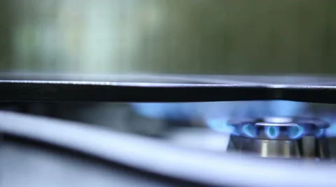 Burning hot plates; focus transfer from one to another Stock Footage 60422994