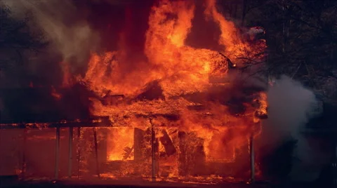 Burning house almost completely consumed by fire Stock Footage 59241941