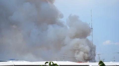 Burning house causes a big pile of smoke Stock Footage 54077652