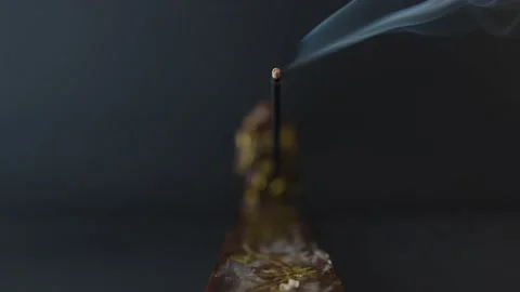 Burning Incense and Buddha on a black background and meditation. Stock Footage 149364366