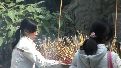 Burning incense, Buddhist temple Stock Footage 289291