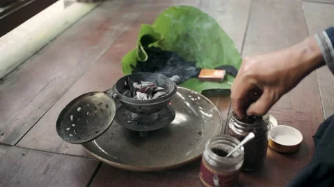 Burning incense on the coals Stock Footage 209853610