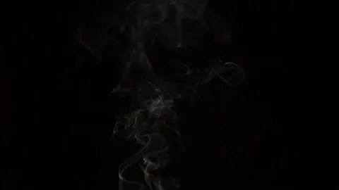 Burning incense stick, scented smoke against black background, chillout footage Stock Footage 166229821