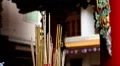 Burning incense sticks offering at the Temple for the various gods, Chinatown HD Footage