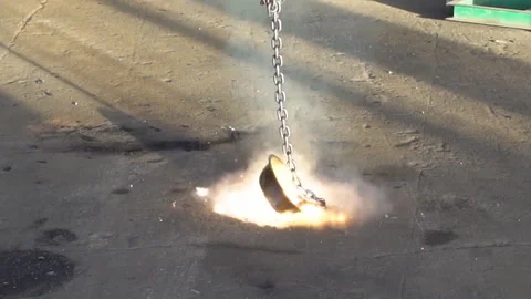Burning items doused with liquid oxygen. Stock Footage 316142913