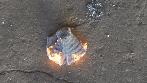 Burning items doused with liquid oxygen. Stock Footage 316142945