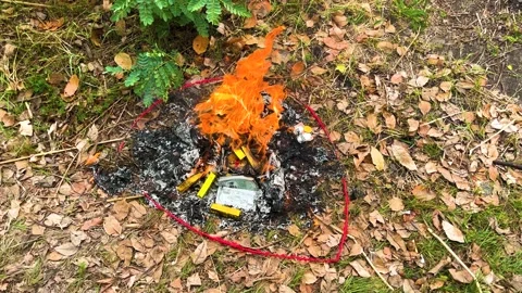 Burning Joss Papers In Front Of A Tomb, Offering To See Off Their Ancestors Stock Footage 310651806