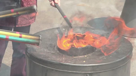 Burning joss sticks Stock Footage 49060308