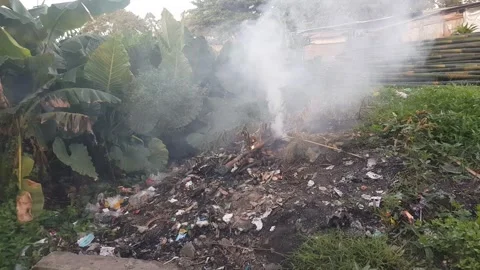 Burning Junk pollutes Stock Footage 267182208
