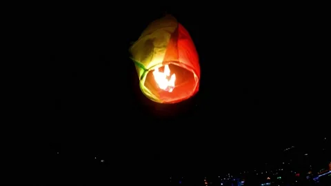 Burning Lantern in Sky Stock Footage 143993194