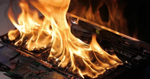 Burning laptop computer electronics clos... | Stock Video | Pond5