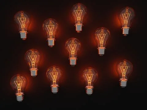 Burning light bulbs on the table Illustrazione stock