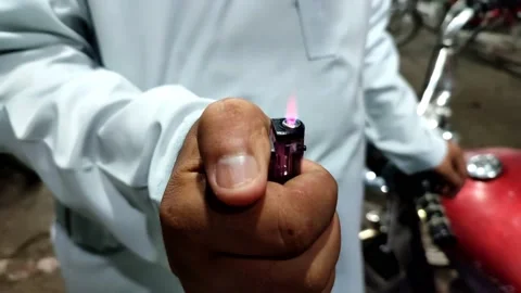 Burning Lighter in Hand Stock Footage 201859296