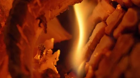 Burning Log Embers Fire Flames in Fireplace Close-up Slow Motion Stock Footage 146222088