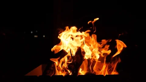 Burning Logs In Fire Pit. Slow Motion. Stockbeeldmateriaal 89991635