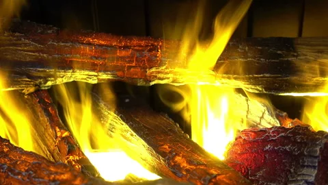 Burning logs in the fireplace. Close-up Stock Footage 108420856