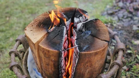 Burning Logs Split By Bright Orange Flames In Rustic Outdoor Wood Fire Closeup 스톡 동영상 344007550
