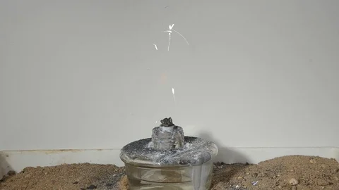 Burning magnesium powder Stock Footage 124466801