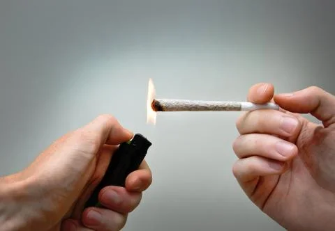 Burning marijuana joint Stock Photos