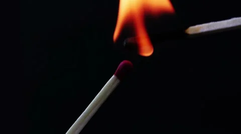 Burning match on black background Stock Footage 8601052