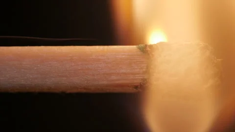 Burning match on black background in macro Stock Footage 106028387
