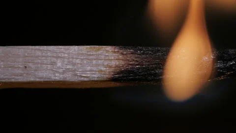 Burning match on black background in macro Stock Footage 106029509