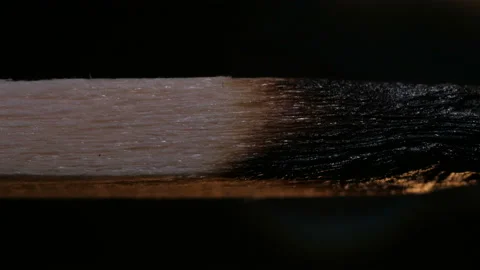 Burning match on black background in macro Stock Footage 106030430