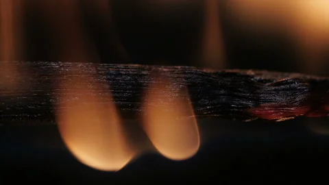 Burning match on black background in macro Stock Footage 106030718