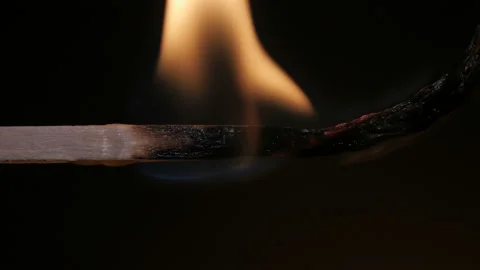Burning match on black background in macro Stock Footage 106031530