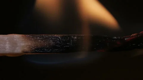 Burning match on black background in macro Stock Footage 106033663