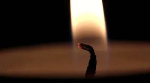 The burning match of a candle turns Видео 19643435