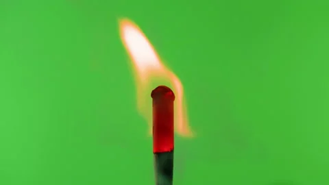 Burning match on green chroma key background. Fire flame from matchstick Stock Footage 198250575