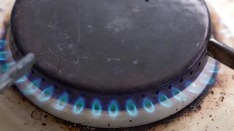 A burning match ignites the gas. Stock Footage 134387195