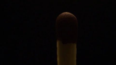 Burning match over black background. Super close up view Stockbeeldmateriaal 83851860