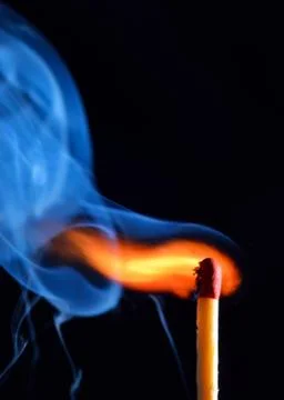 Burning match Stock Photos