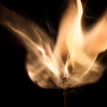 Burning match Stock Photos