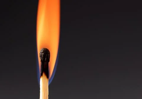 Burning match Stockfoto's