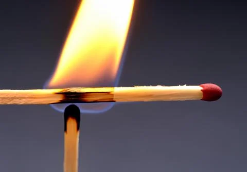 Burning match Stock Photos