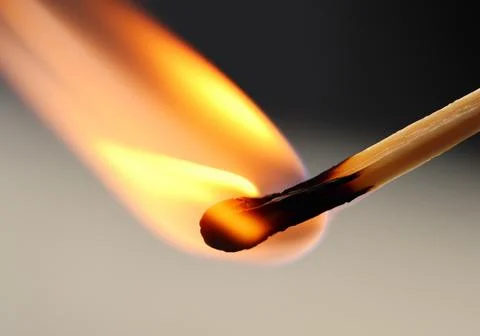 Burning match Stock Photos