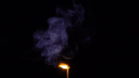 Burning match slow motion Stock Footage